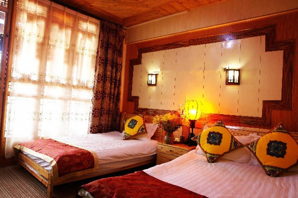 Yunxi Inn Lijiang  Rum bild
