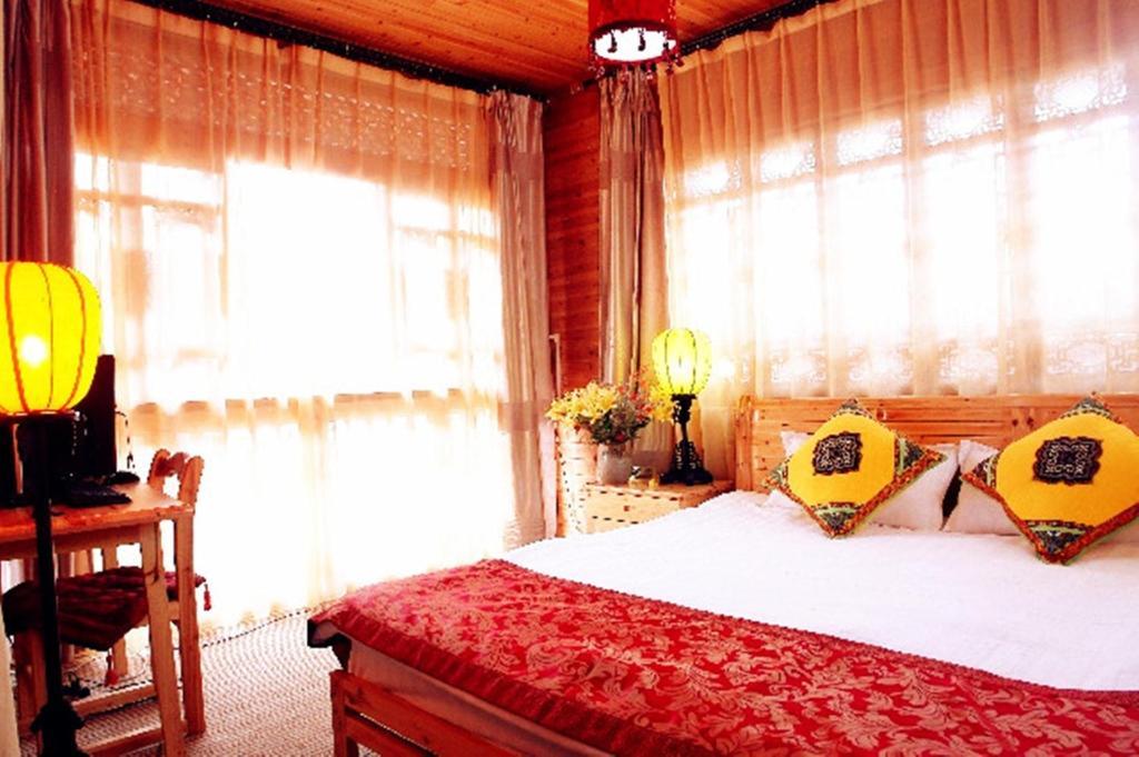 Yunxi Inn Lijiang  Rum bild