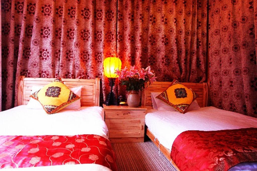 Yunxi Inn Lijiang  Rum bild