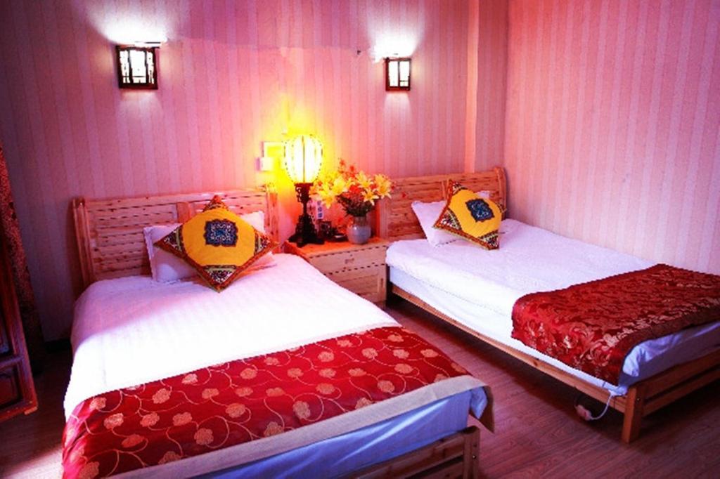 Yunxi Inn Lijiang  Rum bild